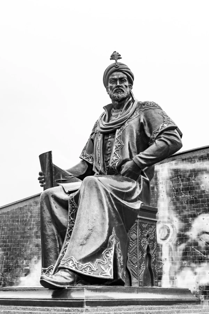 Statue of Ulugh Beg in Samarkand holding a manuscript